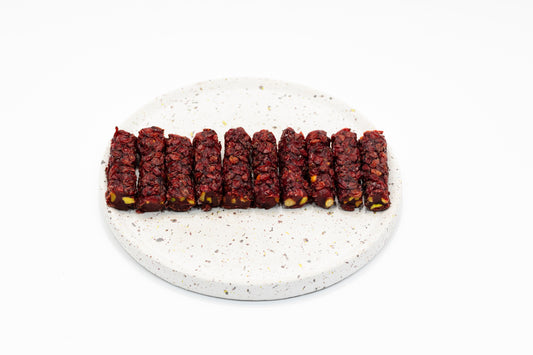 Mini Rol - Granaatappel pistache omhuld met rozenblaadjes